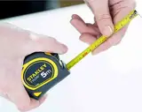 Рулетка вимірювальна Tylon ™ довжиною 5 м, шириною 19 мм, в пластмасовому корпусі STANLEY 0-30-697 — Photo 23
